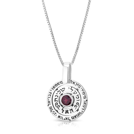 A silver pendant of the "Shekhinah" (Divine Presence) set with garnet.