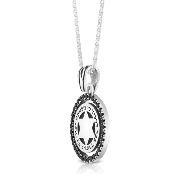 A silver pendant with onyx gemstone encrusted, engraved with the words "Ki Mal'achav" ("For He will command His angels").