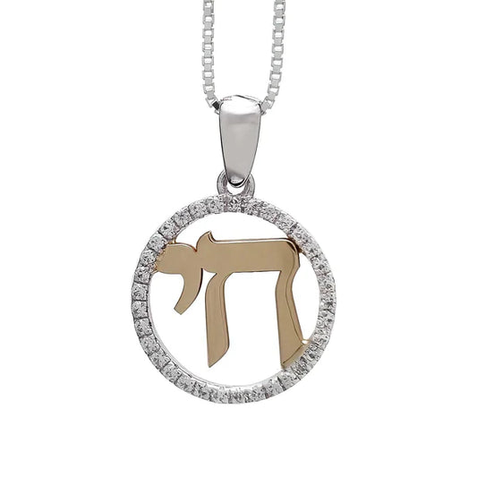 A silver pendant with the word "Chai" (meaning "life" in Hebrew), combined with gold and adorned with cubic zirconia.