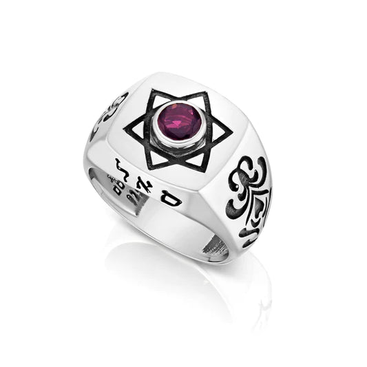 A silver signet ring featuring a natural garnet stone and an engraved Star of David.