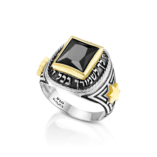 A men's signet ring made of silver with a combination of gold, adorned with an onyx stone.