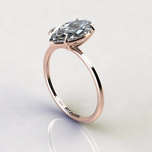 A 14K gold engagement ring with a marquise-cut stone measuring 2 carats.