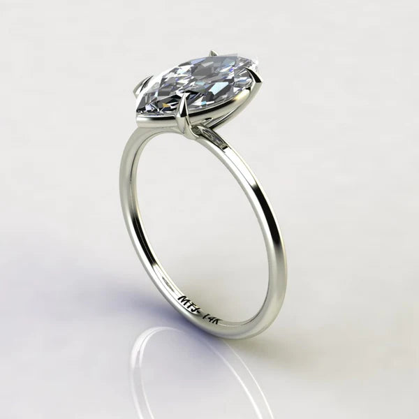 A 14K gold engagement ring with a marquise-cut stone measuring 2 carats.