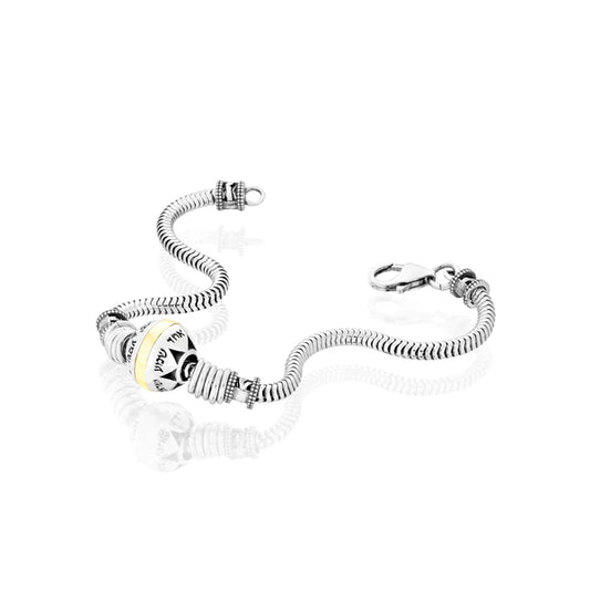 A silver ball bracelet with a gold combination and the inscription "Shema Yisrael."