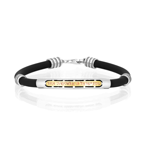 A silicone bracelet with "Shema Yisrael" inscription, made of silver with gold accents.