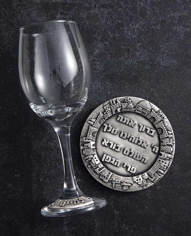 "A Kiddush cup with an intricately designed base"