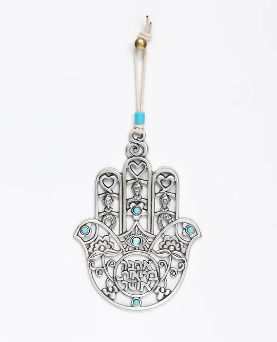 A stunning Hamsa wall hanging embellished with turquoise.