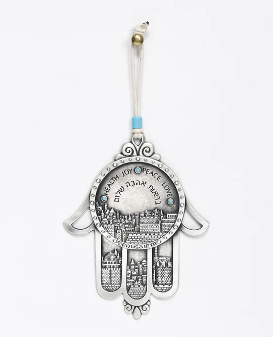 A hanging Hamsa with an embedded Jerusalem motif.