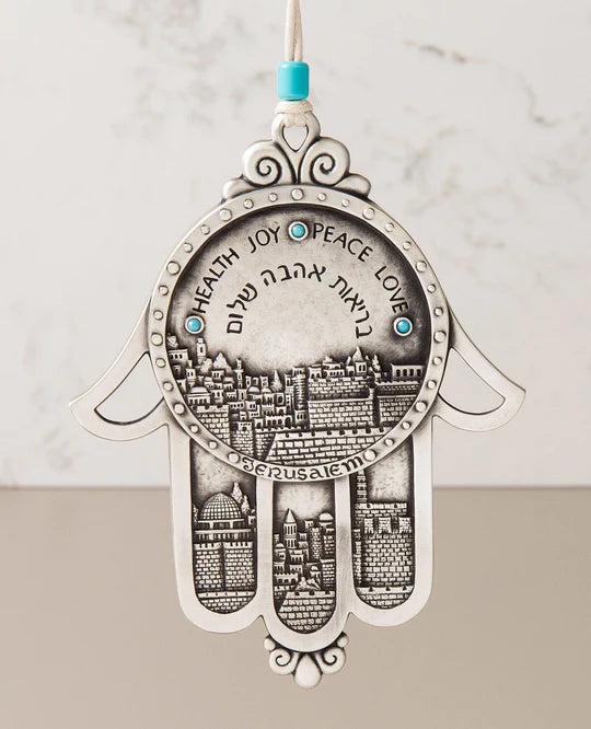 A hanging Hamsa with an embedded Jerusalem motif.