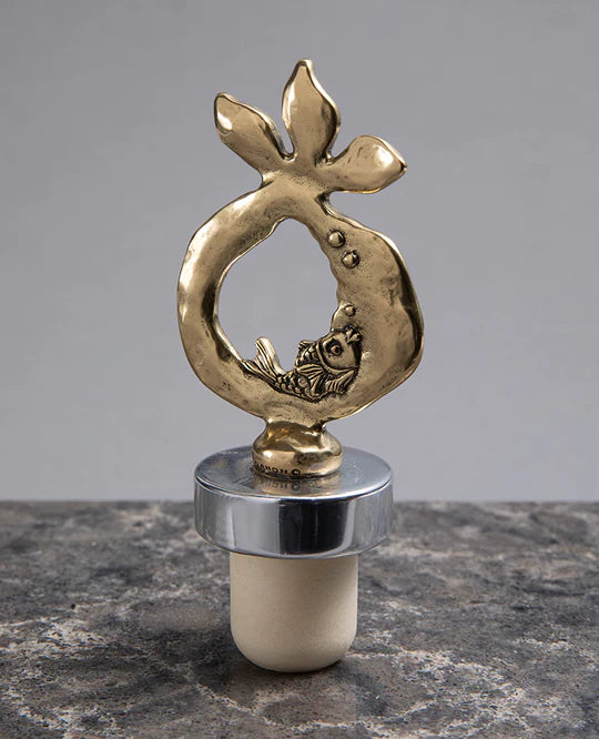 Bronze-coated pomegranate wine stopper.