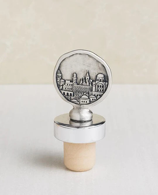 Silver-plated Jerusalem-themed bottle stopper.