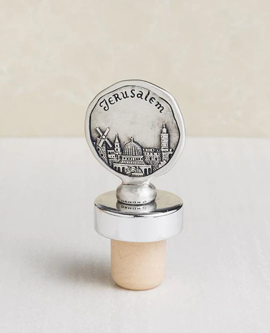 Silver-plated Jerusalem-themed bottle stopper.