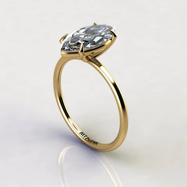 A 14K gold engagement ring with a marquise-cut stone measuring 2 carats.